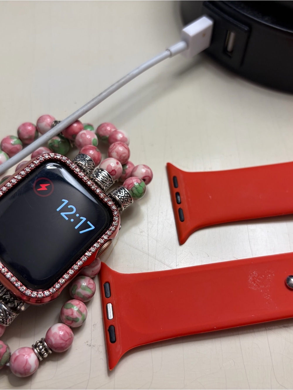 Apple Watch with Red Band and Decorative Bezel